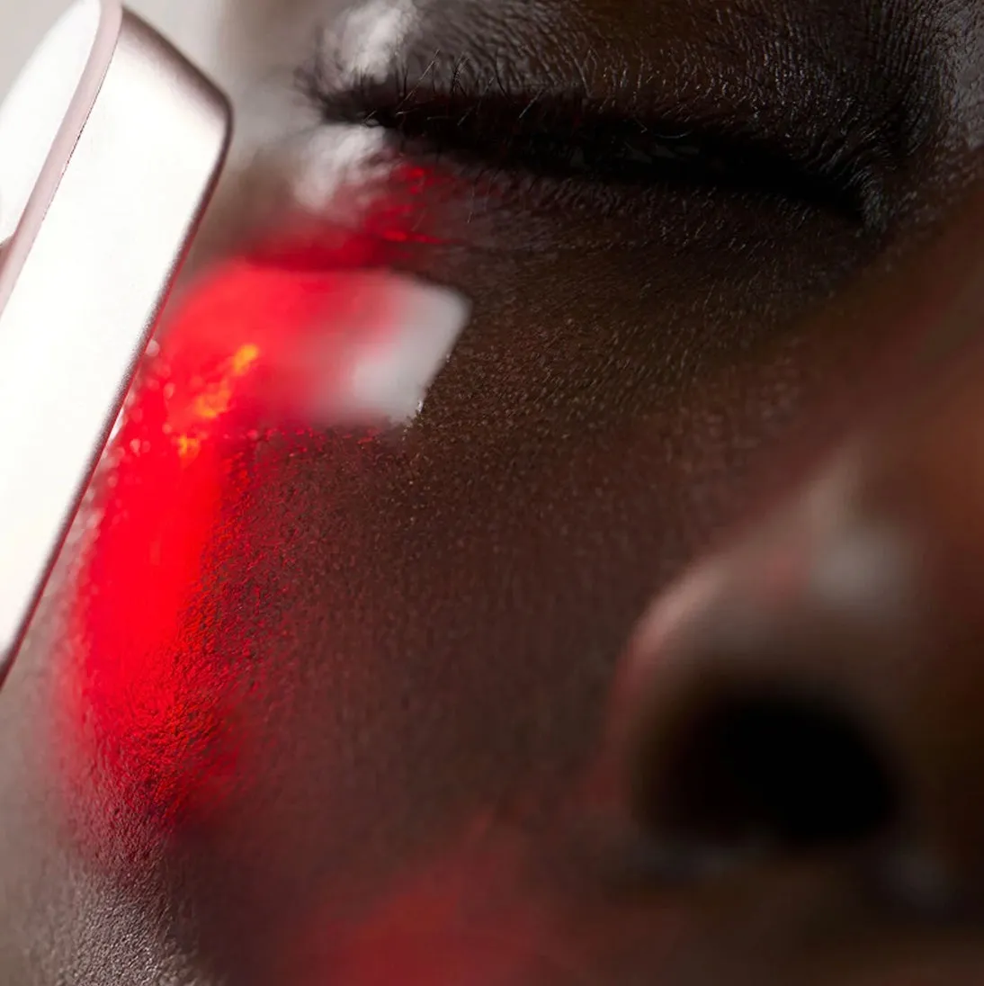 Red light shining on skin